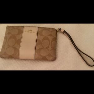 Coach Wristlet, signature design w/cream stripe.